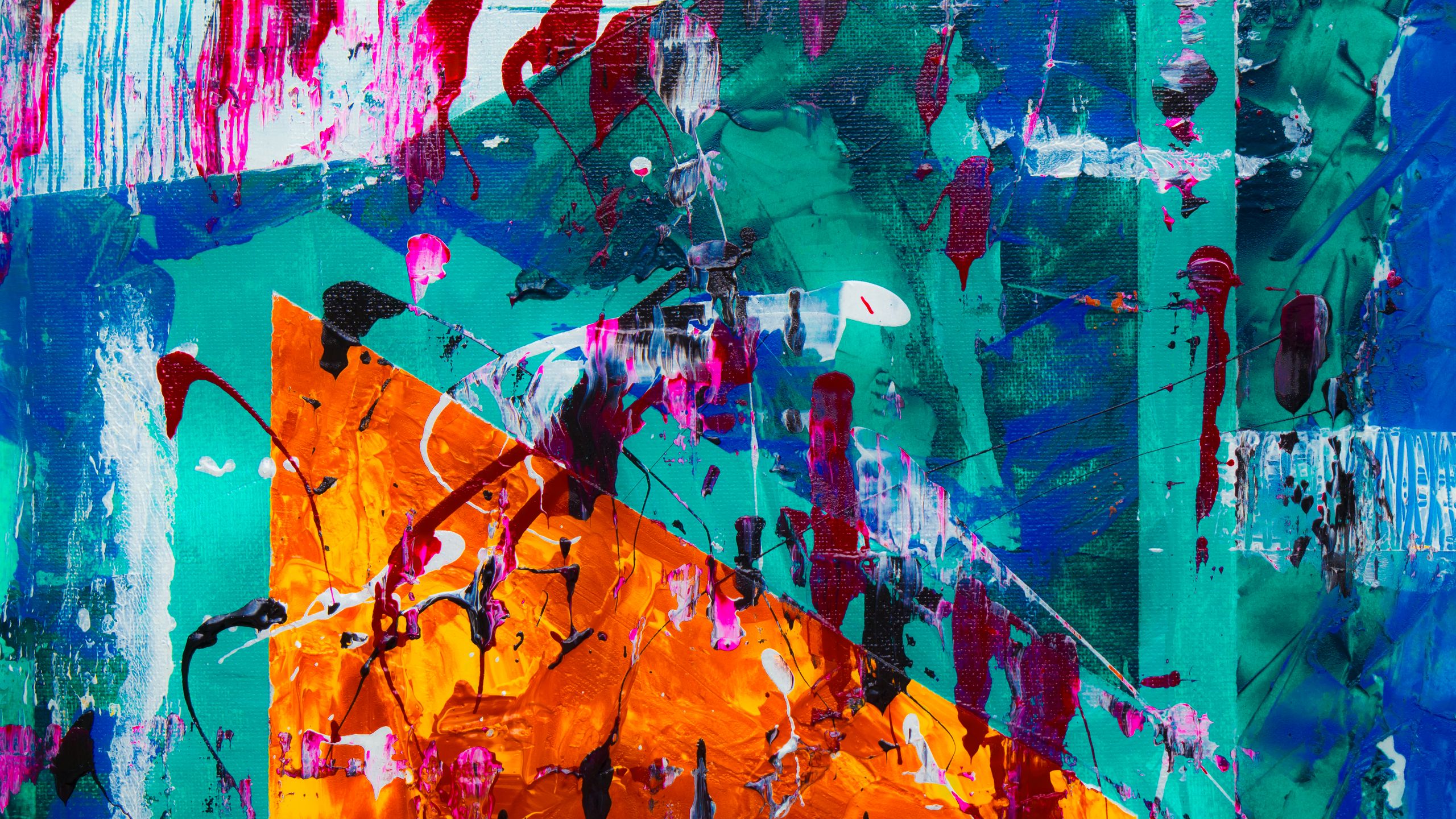 Colorful abstract expressionist painting with acrylics on canvas with vivid splashes.